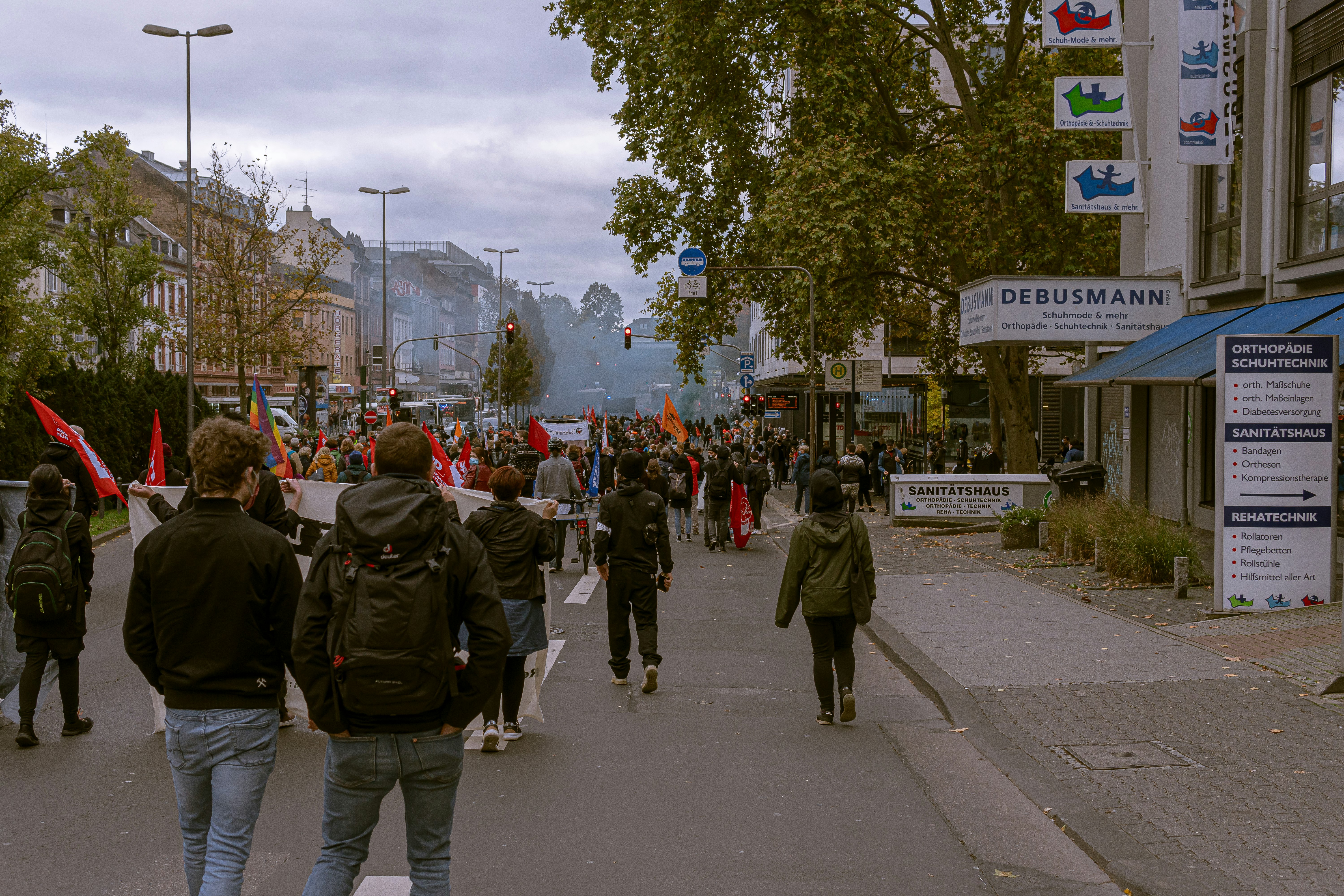 people walking on sidewalk during daytime